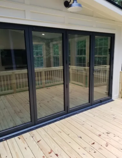 A sliding glass door on a deck.